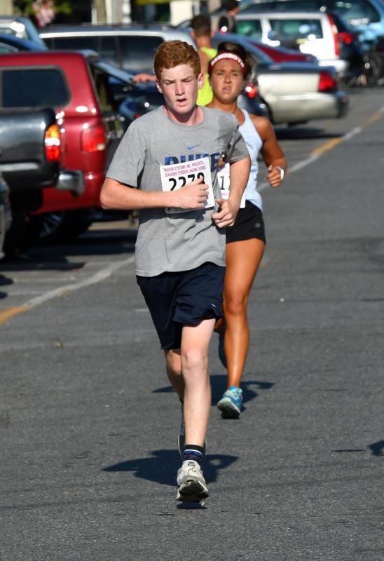 Declan Morrissey of Rehoboth Beach finishes with a time of 22:59.