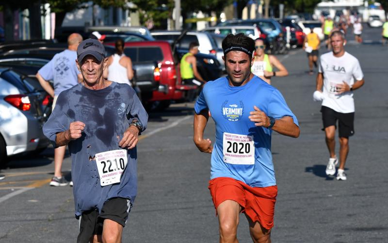 Dave Landis of Selbyville, left, and Bryan Bowles of Rehoboth finished in 23:32 and 23:30, respectively.