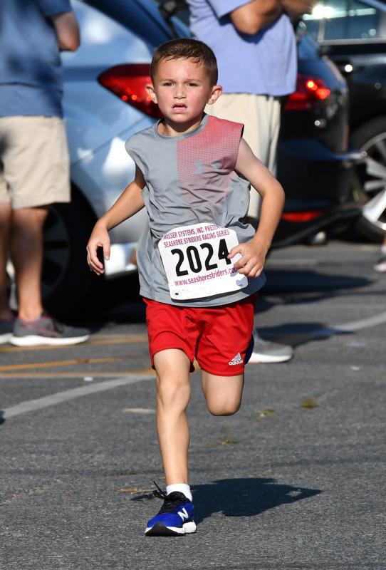 Landon Bratz of Bridgeville finishes in 26:35 for second place in the 0-9-year-old age group.