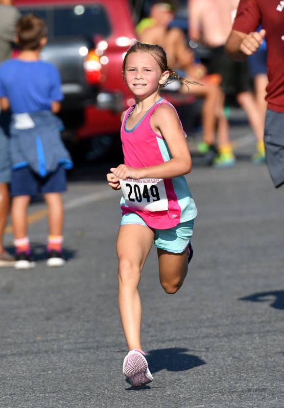 Emma Etters of Altoona, Pa., finishes first in the female 0-9 group with a time of 28:48.