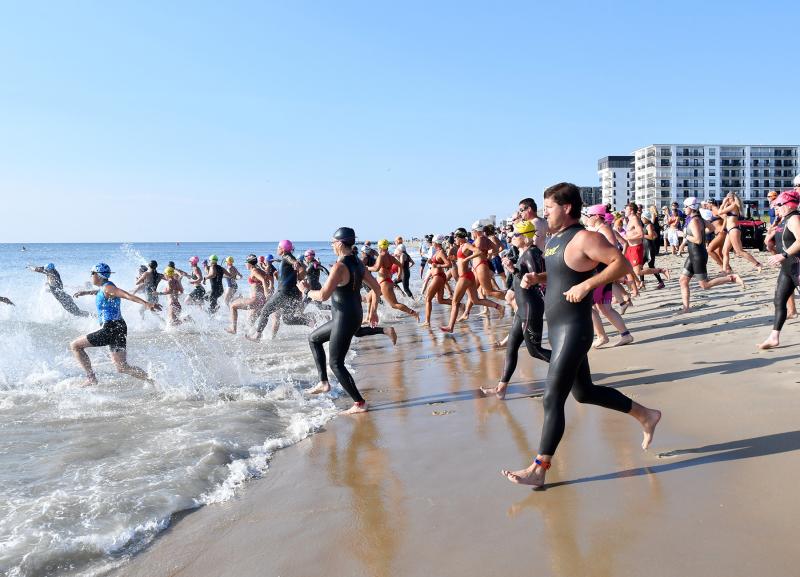 The second wave leaves the beach.
