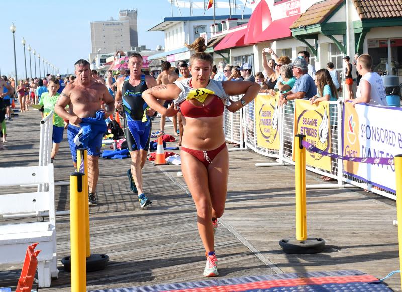 Kristina Newton of the Rehoboth Beach Patrol leaves the transition area. She finished with a 46:04.