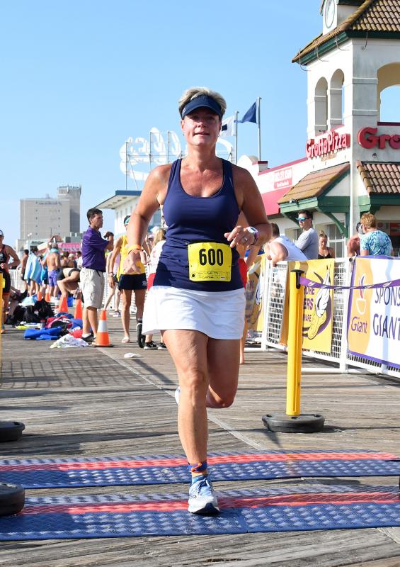 Carla Phillips Yngve leaves the transition area. She teamed with her husband Kurt to place 16th in the team group with a time of 50:30.