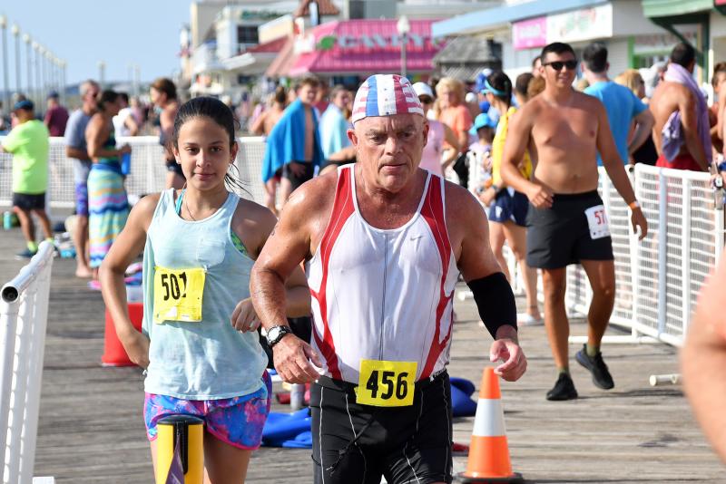 Dell Pearson, right, of Millsboro and Neda Brinster of Bronxville, N.Y., leave the transition area.