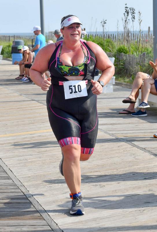 Cindi Dietrle of Rehoboth finishes the event in 1:03.23.