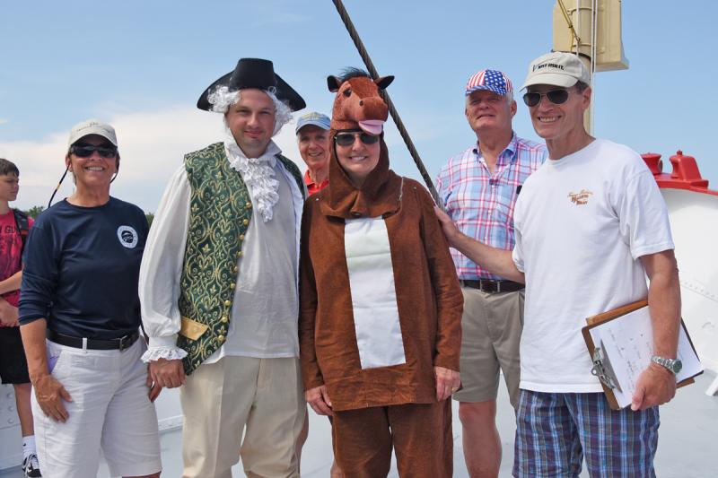 Lady Hilda received honorable mention for rowing all the way from Roosevelt Inlet. Shown are (l-r) Bev Rosella of Freedom Boat Club, Matt Grieg of Lady Hilda, Albert Didden of the Overfalls Foundation, Hilda Adams of Lady Hilda, Mayor Ted Becker and Jim Hooban, president of the Lewes-Rehoboth Rotary.