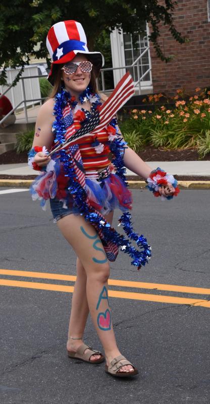 If they gave out a prize for the most colorful marcher, Julia Edmonds of Lewes has to be in the running.