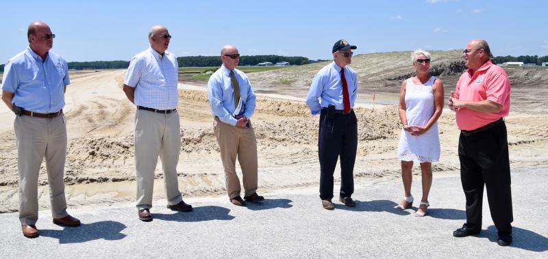 Attending a press conference to announce two FFA grants are (l-r) Delaware Coastal Airport Manager Jim Hickin, Sussex County Council President Mike Vincent, Sussex County Administrator Todd Lawson, U.S. Sen. Tom Carper, Rep. Ruth Briggs King and Georgetown Mayor Bill West. RON MACARTHUR PHOTOS