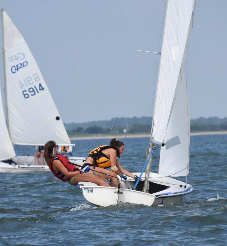 Club 420 sailors Rachel Delie and Sarah Krajewski of Lewes Yacht Club head into the wind toward the finish.
