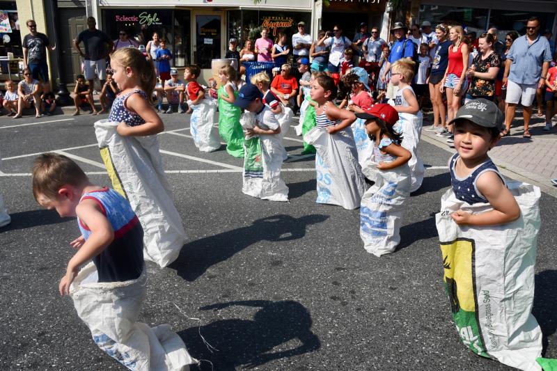 Young sack racers get off to a jumping start.