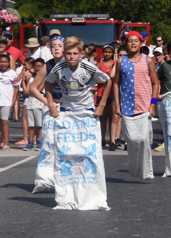 Charlie Undorf of West Chester, Pa., has no competition as he wins his heat in the sack race.