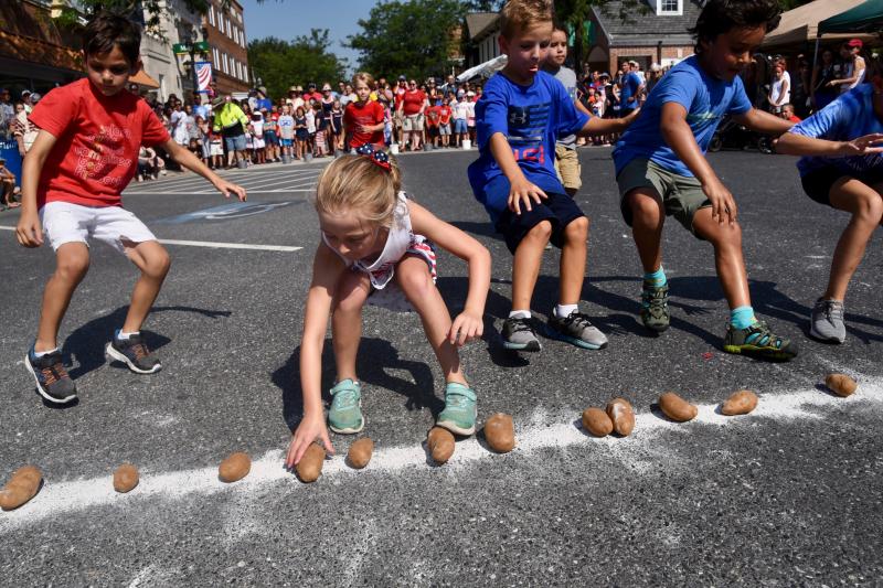 It’s critical to reach the line first in the potato relay race.