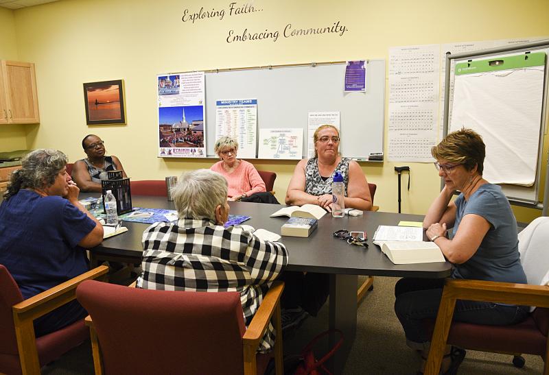 Adults discuss the same lesson as the children, without the crafts. Shown are (clockwise from right) Rev. Vicky Starnes, JoAnn Merrick, Patty Brown, the Rev. Majorie Belmont-Burns, Suzanne Landon, and Rhonda Gawronski.