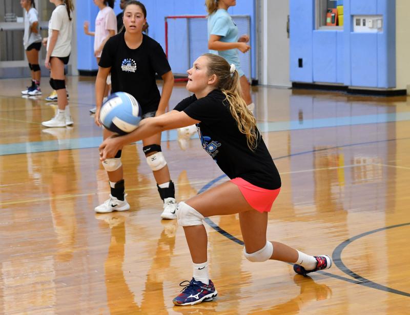 Cape junior libero Emily Lamb bumps a dig.