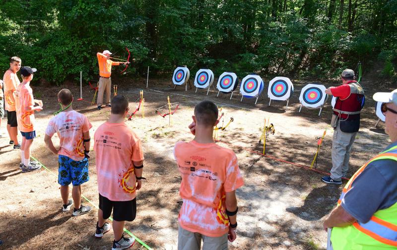 Instructors from the Delaware 4-H Shooting Sports and Wildlife Conservation Program demonstrate proper shooting technique.