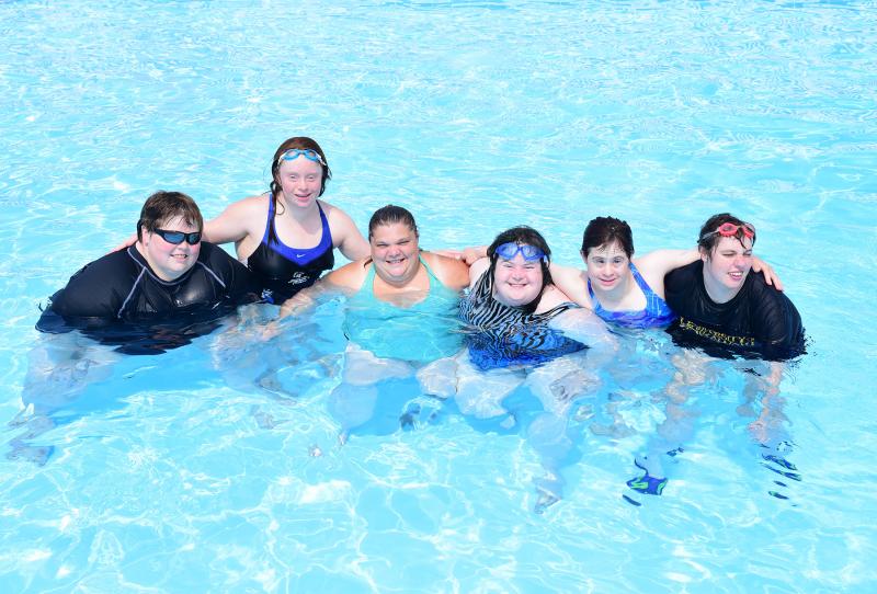 Taking a break in the cool pool are (l-r) Julie Gibbons, Torie Moore, April Robinson, Laura Lemon, Lynn Dolphin and Maura Ganc.