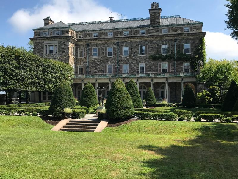 The mansion, in its neoclassical architectural style of total symmetry, is three times as long as it is wide. An amazing collection of art and sculpture collected by three generations of Rockefellers is spread throughout the property, inside and out.