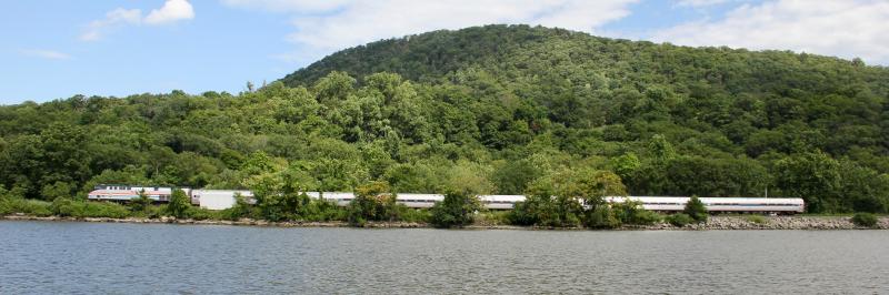 Trains coming and going are as constant here as the tides. Passenger trains on the east side of the river, freight trains to the west.