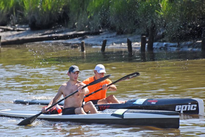 Race winner Nik Alshayev, 33, left, and Cliff Roach, 58, stay stroke-for-stroke through the midpoint of the race.