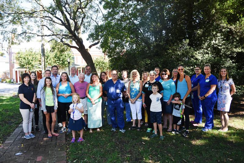 Among those who helped turn the town teal in Lewes are Mayor Ted Becker; Sen. Ernie Lopez, R-Lewes; City Councilman Dennis Reardon; Dr. Steven Berlin and Dr. Leo Eschbach of Beebe Healthcare and their staff; Ellen Lorraine McCabe, City of Lewes; Haley Will; Nancy Will; Niki Morris; Deb Reed; Sue Ann Newsham, Beebe Emergency Department nurse manager; Susan Mross, Beebe Emergency Department charge nurse; Kelly, Brooks and Sienna Serpico; and Jane and Alex Mavity. NICK ROTH PHOTOS