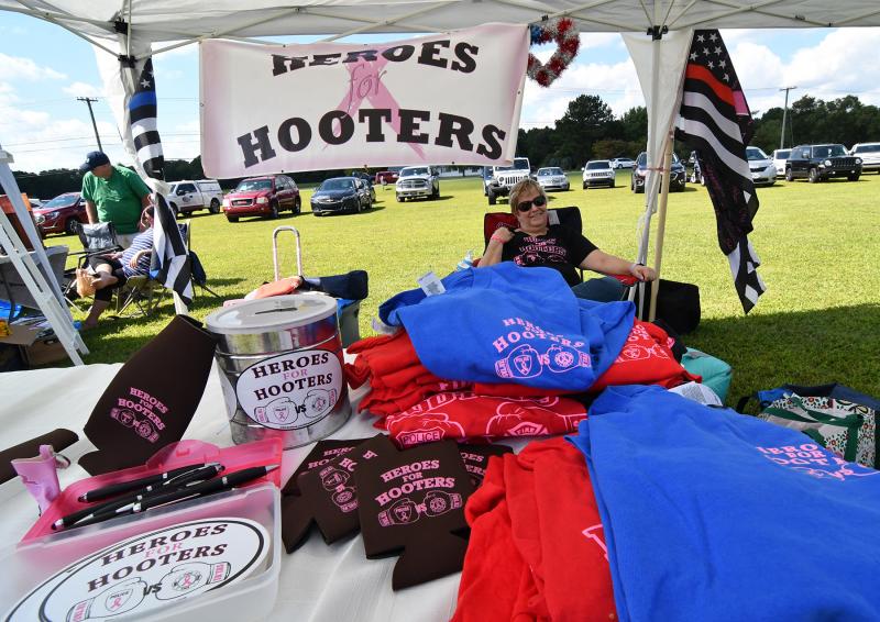 Heroes for Hooters had a booth at the event. H for H raises money and awareness for breast cancer and to provide positive recognition for local police officers and firefighters, and the military.