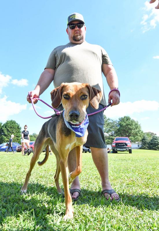 GRR volunteer Kevin Thompson shows off Charlie. Charlie is still waiting for someone to give her the loving home she deserves.