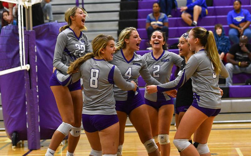 Delmarva Christian celebrates the 1,000th assist by Ashlyn Stonebraker. Shown are (l-r) Savannah Stewart, Kandice Schlabach, Stonebraker, Mia Berger, Grace Fetterman and Sierra Troyer. DAN COOK PHOTOS