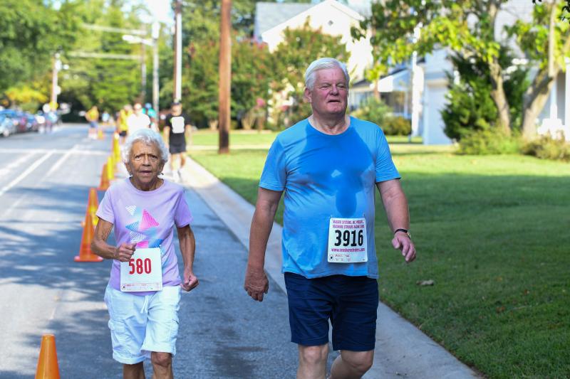 Faye McDaniel and Ted Becker are walking buddies.