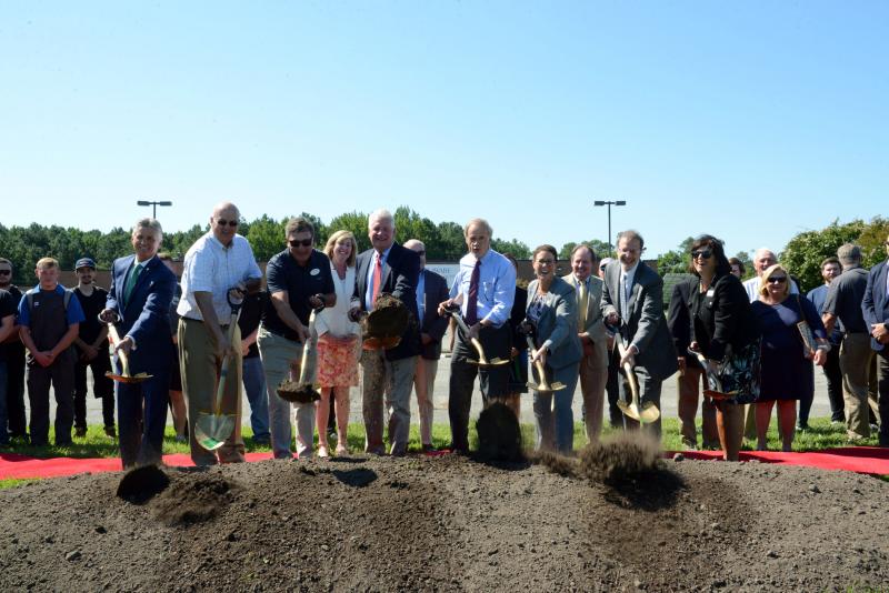 Shown breaking ground are in front (l-r) DTCC Owens Campus President Dr. Mark Brainard, Sussex County Council President Michael Vincent, IG Burton owner Charlie Burton, Megee Motor Co. President Terry Megee, U.S. Sen. Tom Carper, DTCC Owens Campus Vice President and Campus Director Dr. Bobbi Barends, Economic Development Administration Deputy Assistant Director for Regional Affairs Dennis Alvord, and Philadelphia Regional Office Director Linda Cruz-Carnall. STEVEN BILLUPS PHOTOS DelTech Automotive