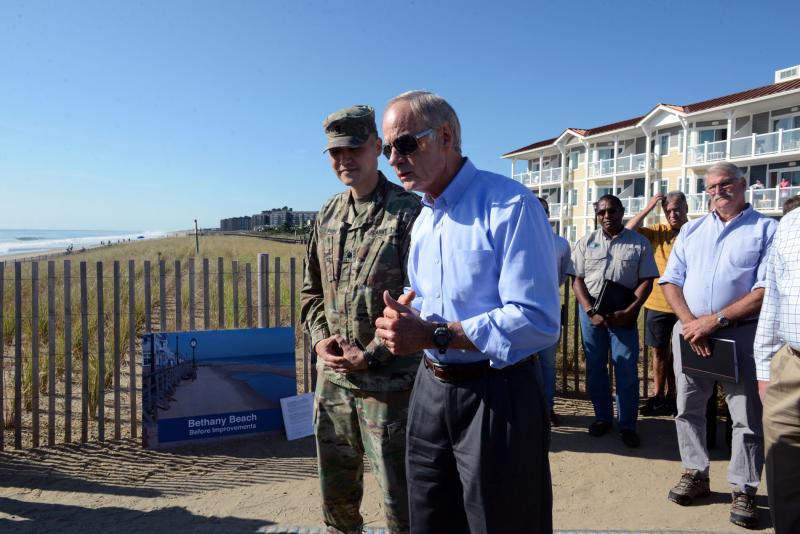 Sen. Tom Carper, right, explains the risks coastal communities face. U.S. Army Corps of Engineers Philadelphia District Commander Lt. Col. David Park also spoke. Park said that replenishment of Rehoboth and Dewey beaches will start in October. Carper Corps of Engineers