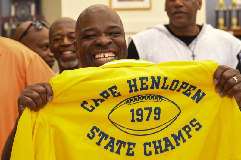 Tim Gray always wins the broad smile award. He is happy to be regifted a 1979 championship jacket that belonged to Harry Moore.