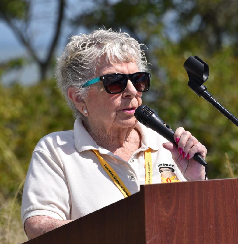 Bev Dalecki, an association board member whose father served at Fort Miles, reads names of fallen Delaware World War II veterans.