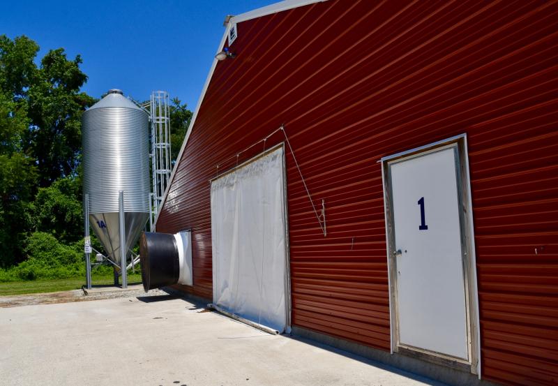 A concrete pad at the loading door keeps manure residue from getting on the ground.