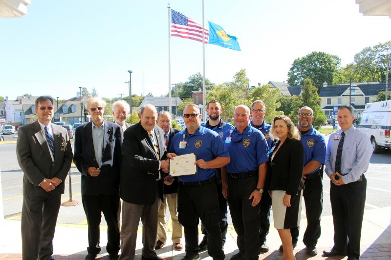 Shown during the presentation are (l-r) chapter members Buddy Clark, Wayne Weimer, Darryl Hudson, Bill Richardson and Bill Regli. Accepting the honor on behalf of Beebe Healthcare are public safety officers, Joe Pembroke, Mark Broadhurst, Andy Markovitz, Jeff Fox, and Darnell Coston, along with Marcy Jack, vice president and chief quality and safety officer, and head of security Frank Molino. SUBMITTED PHOTO