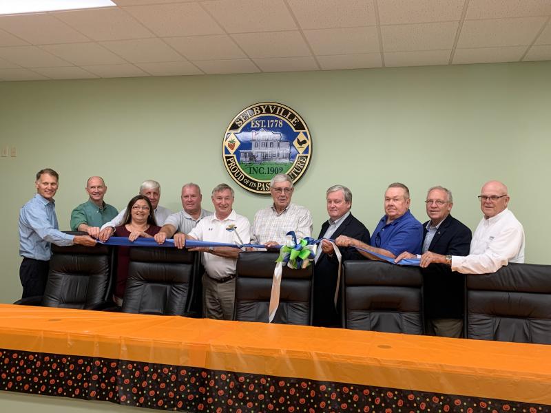 Celebrating new council chambers in Selbyville Town Hall are (l-r) Rep. Ron Gray, R-Selbyville; Mike Wigley, Councilman Jay Murray; Town Manager Stacey Long; Councilman Rick Duncan; Coleman Bunting; Mayor Clifton Murray; Sussex County Councilman John Rieley; Councilman Frank Smith; Rep. Rich Collins, R-Millsboro; and Councilman Clarence Tingle. SUBMITTED PHOTO