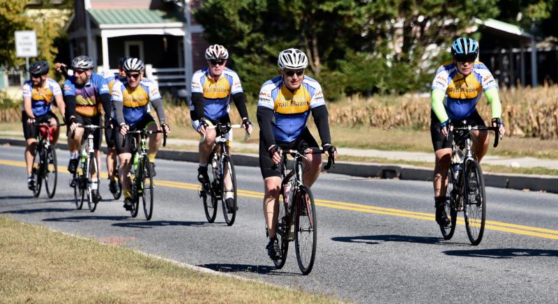 Mount Vernon Trailblazers team members ride along Mulberry Street in Milton as they near the 51-mile mark on the first day of riding. RON MACARTHUR PHOTOS