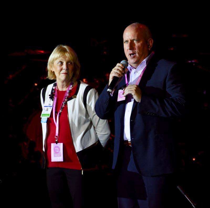Judy Aliquo, vice president of development, Beebe Medical Foundation, left, and Tom Protack, CEO and president of the foundation, thank the jazz festival for its $100,000, 5-year pledge to the Tunnell Cancer Center. RON MACARTHUR PHOTO