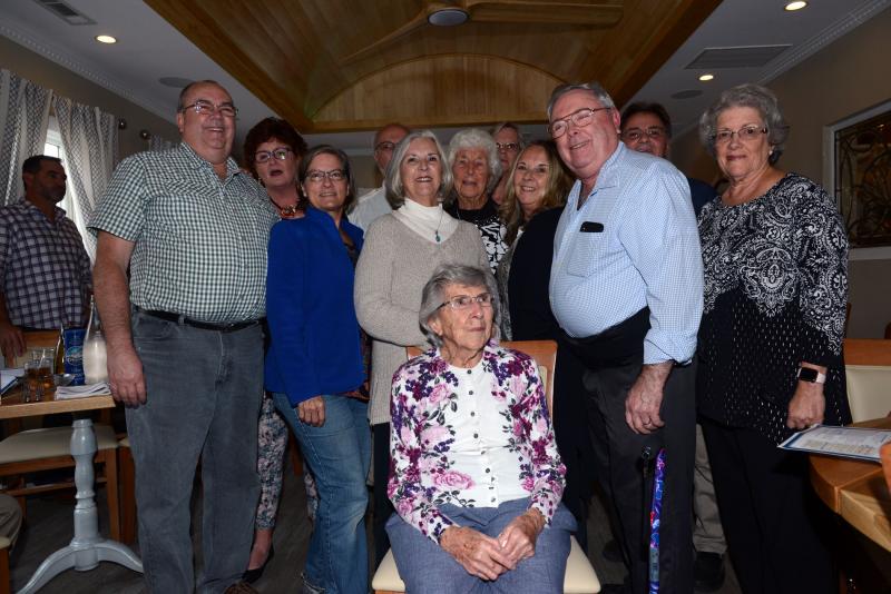 Josephine Hearne is surrounded by her family at ther surprise birthday party. Shown in back are (l-r) Karen Hart, Tom Hearne, Mary Lou Hearne and Stan Sakowski. in the second row are Doug Hearne, Sabrina Hearne, Sharon Morris, Ruth Cannon, Cindy Sakowski and Gary Hearne. in front is Josephine Hearne. 95th Birthday