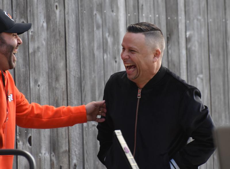 Guitarist JJ Sansaverino shares a laugh before his set at Dogfish Head in Milton Oct. 18. NICK ROTH PHOTO
