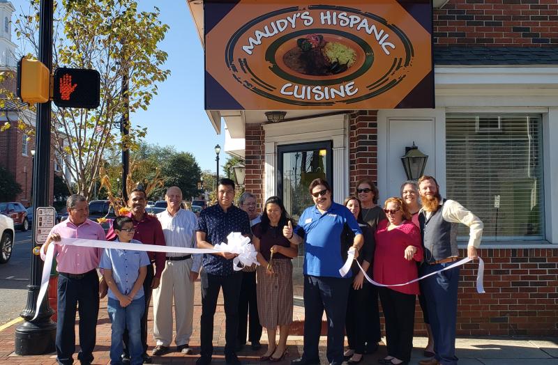 Celebrating the ribbon cutting with family and friends are (l-r) Pastor Anastacio Matamoros; owner Nehemias Mendez; Judy Dean, chamber board member; owner Maudilia Mendez; Anthony DelFranco, Georgetown chamber president; Jamie Craddock and Jocelyn Godwin, Town of Georgetown; and Linda Price, Donna Koske and Michael Fabber, chamber board members. SUBMITTED PHOTO