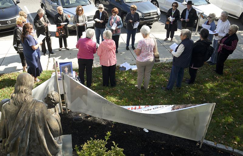In Rehoboth, at St. Edmond Roman Catholic Church, a group of about 20 began promptly at noon to recite the rosary for half an hour. DENY HOWETH PHOTOS