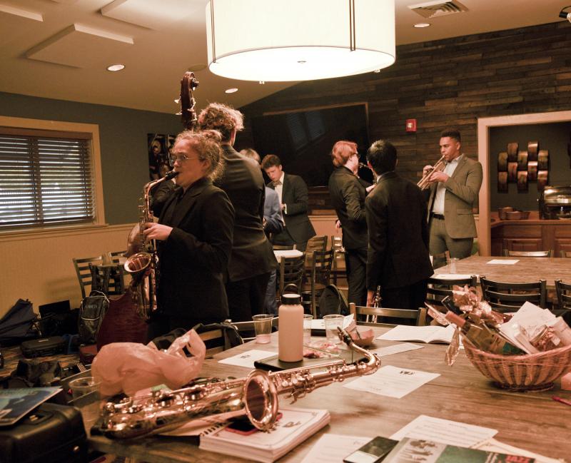 Cape High musicians warm up their instruments in the green room at Bethany Blues Oct. 16. DENY HOWETH PHOTO