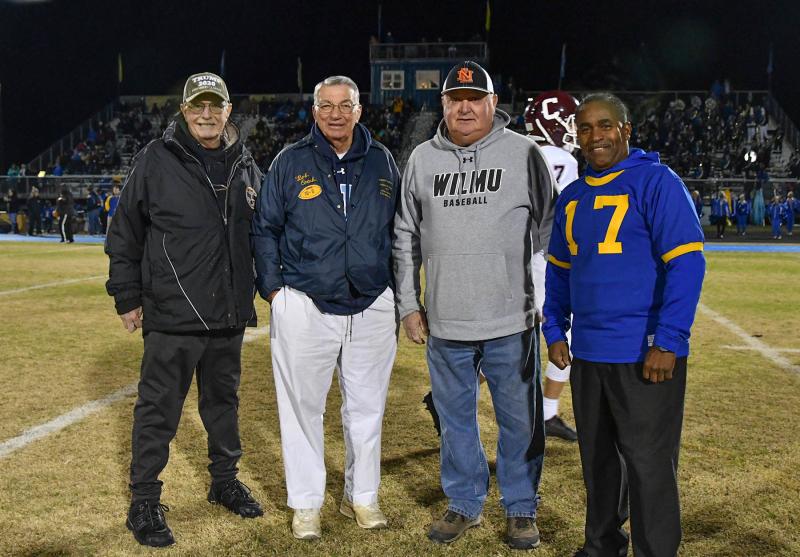 Honorary captains for the game are (l-r) former player Don Layfield, coach Bob Cuthrell and players Lloyd Mears and Frank Roach.
