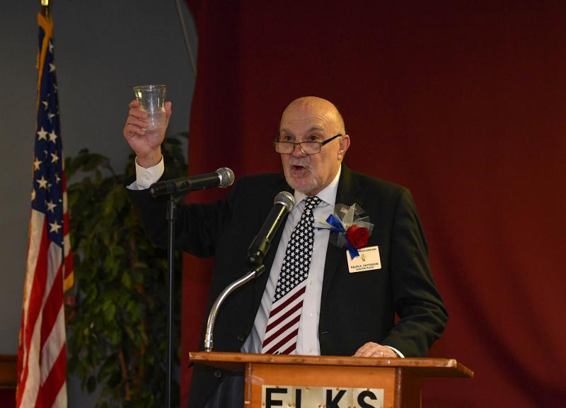 Elks Lodge 2540 Exalted Ruler Ralph E. Patterson gives a toast for those who answered the call to serve.