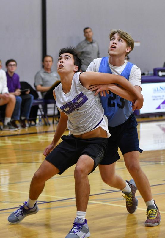 Royals forward Nathan Moyer boxes out Cape’s Samuel Luciano-Solomon.