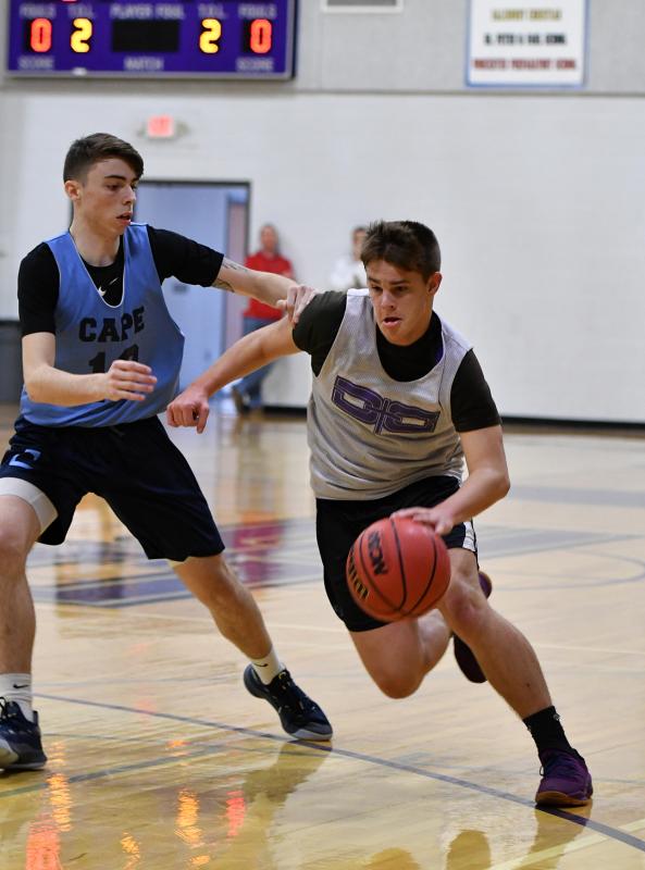 Royals’ guard Wyatt Kwiatkowski, right, drives past Cape’s Collin Mallet.
