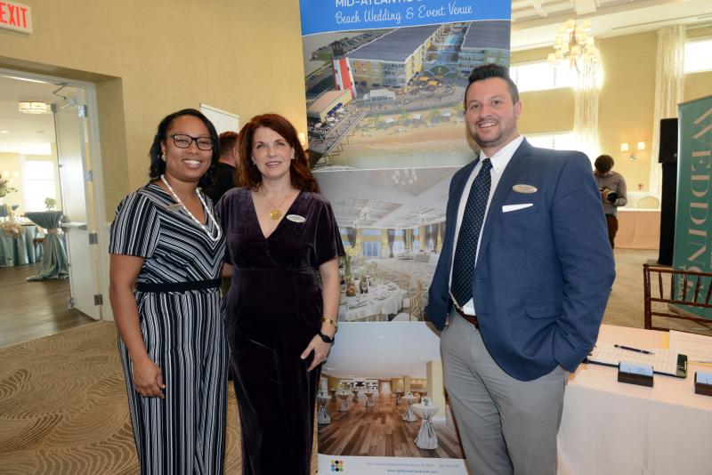 Lighthouse Cove Event Center staff pause for a photo. Shown are (l-r) Director of Sales Falan Williams, Catering Manger Lisa Wilgus and Corporate Director of Sales and Marketing Skip Coleman. Wedding give away