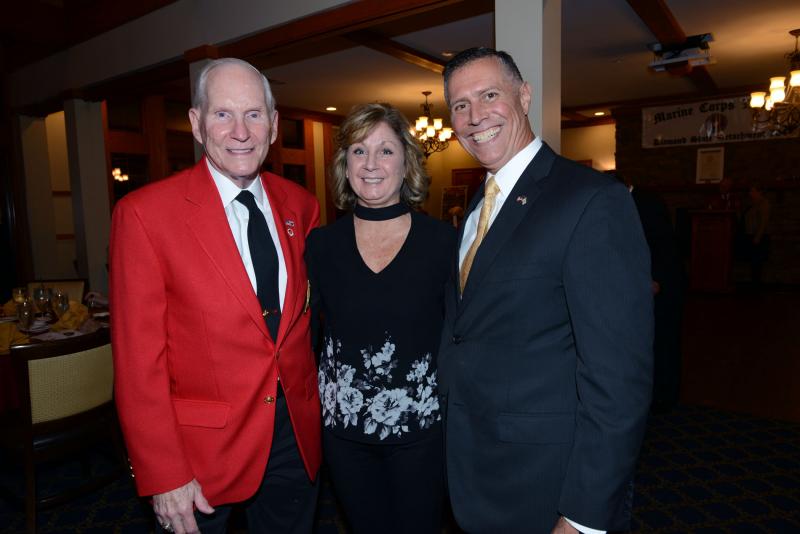 Enjoying the event are (l-r) MCL Detachment 704 Judge Advocate Frank Barnes and Judy and Rep. Steve Smyk, R-Milton. Marines Celebrate 244th Birthday