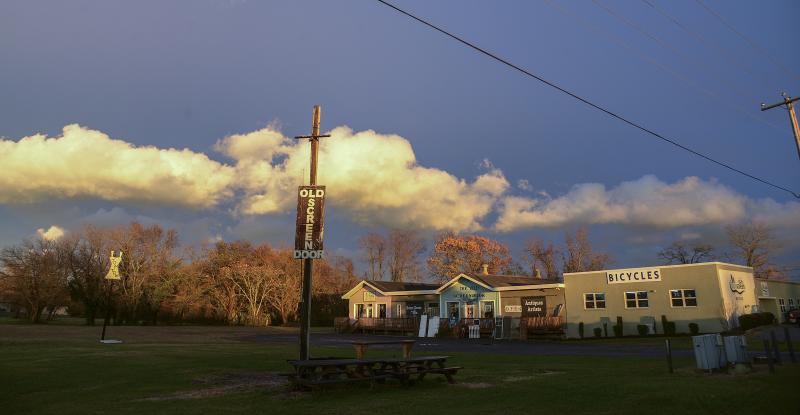 As the sun slips down the horizon, a break in storm clouds offers a glowing sunset. DENY HOWETH PHOTO