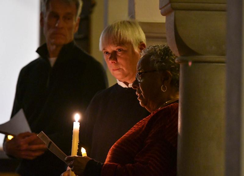 Reading the names during the service are (l-r) Rehoboth Mayor Paul Kuhns, Cathin Bishop and Sharon Pembry